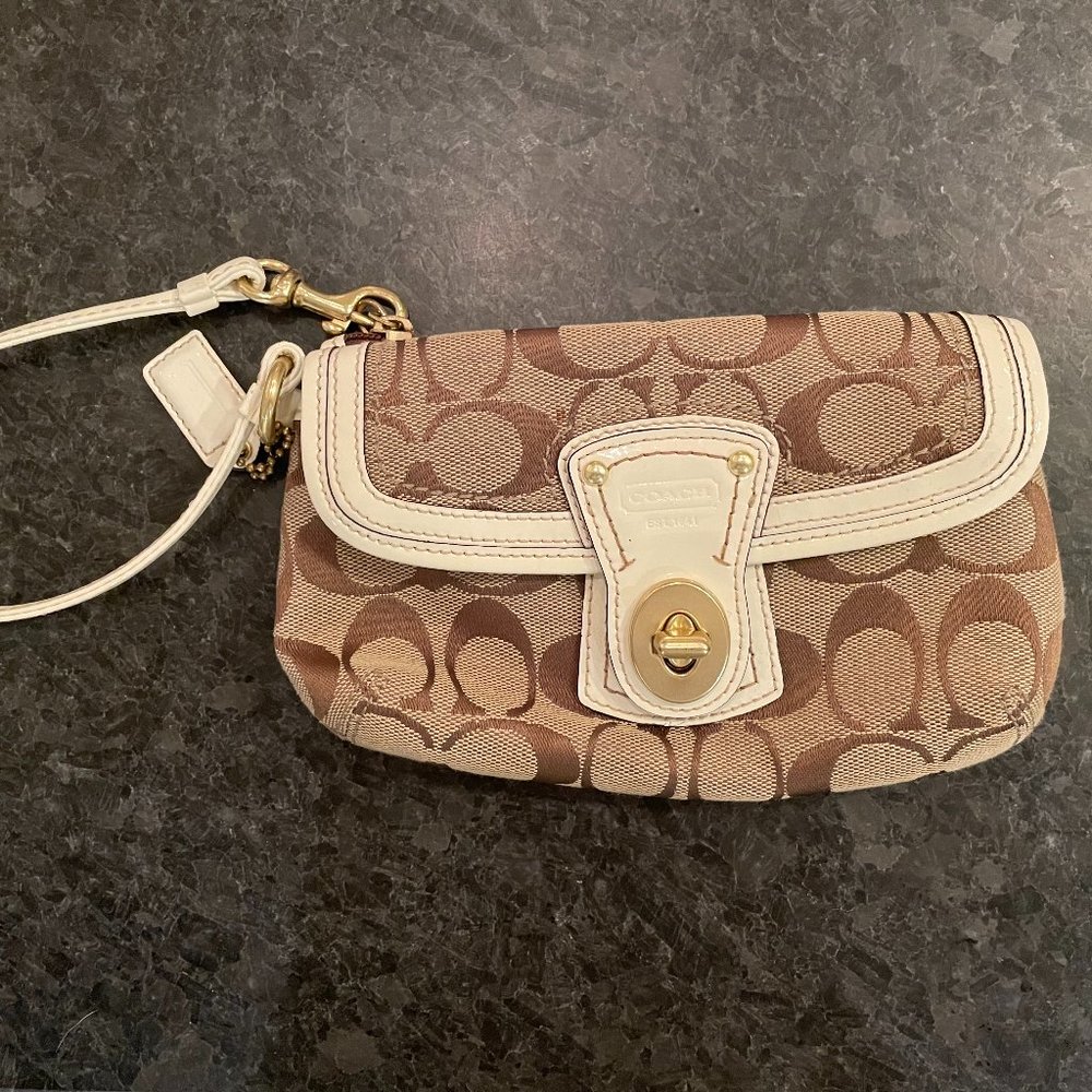 COACH tan and brown wristlet